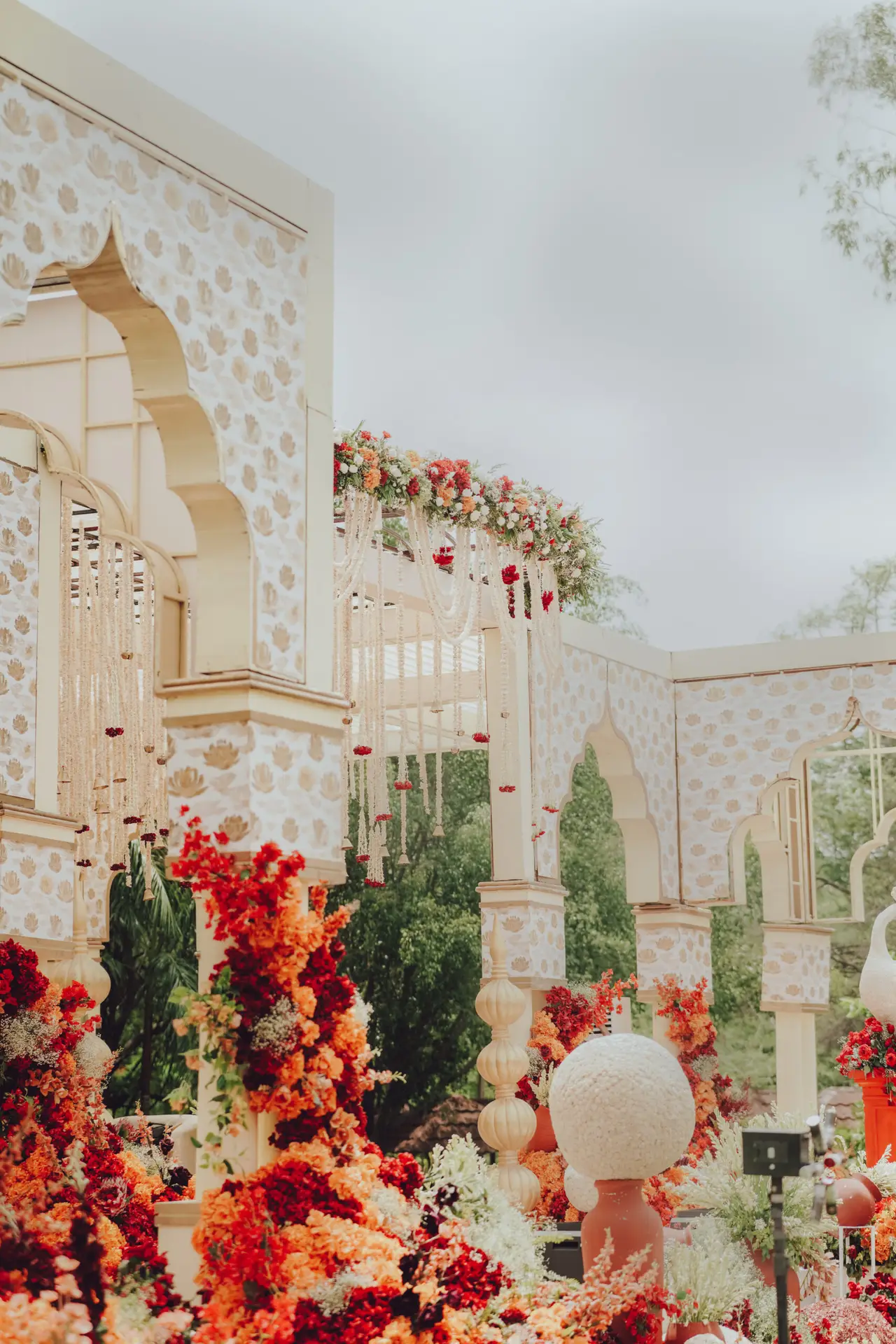 How to Move 300 Wedding Guests Around Rajasthan Without Chaos Night wedding reception and illuminated palace courtyard in Rajasthan