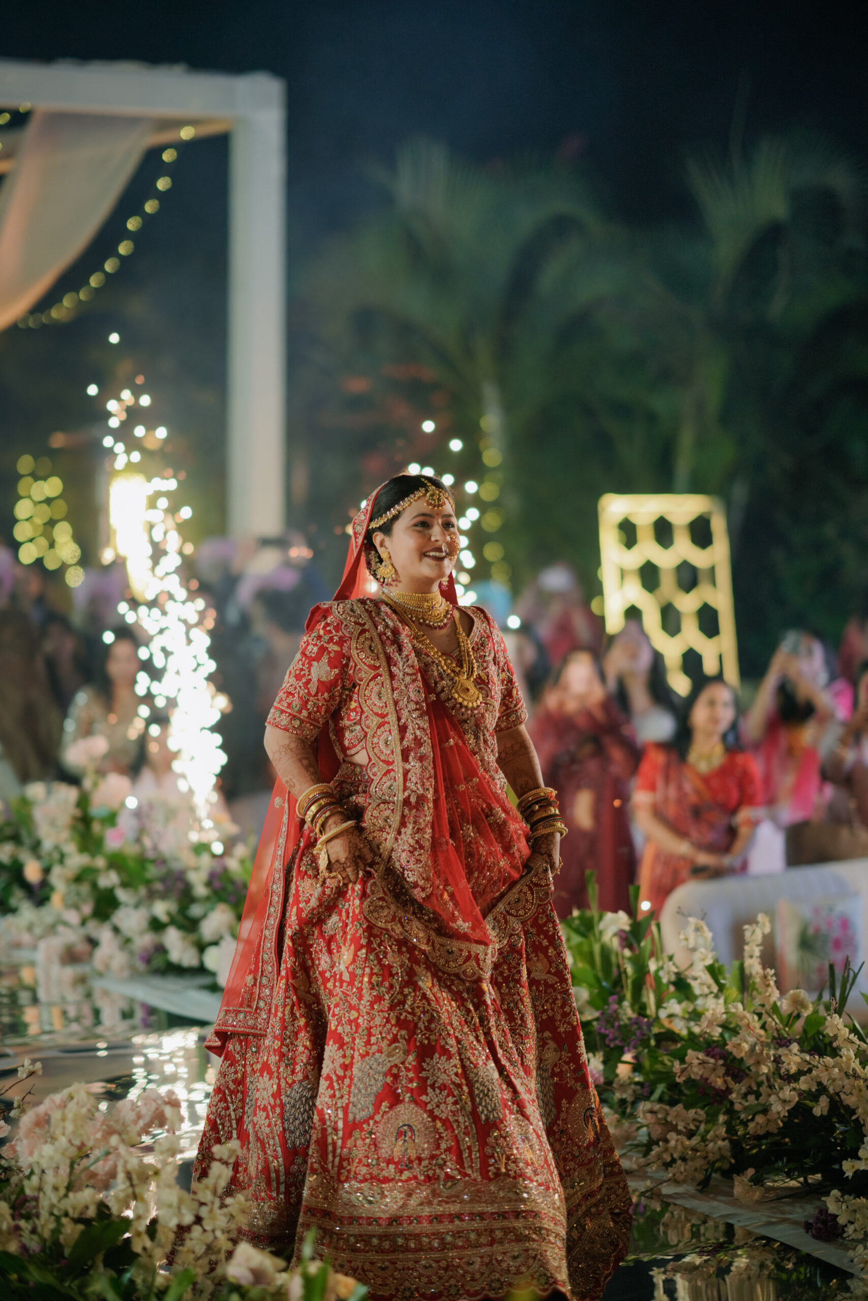 Mirrored glass bridal entry runway with cold spark fireworks Udaipur